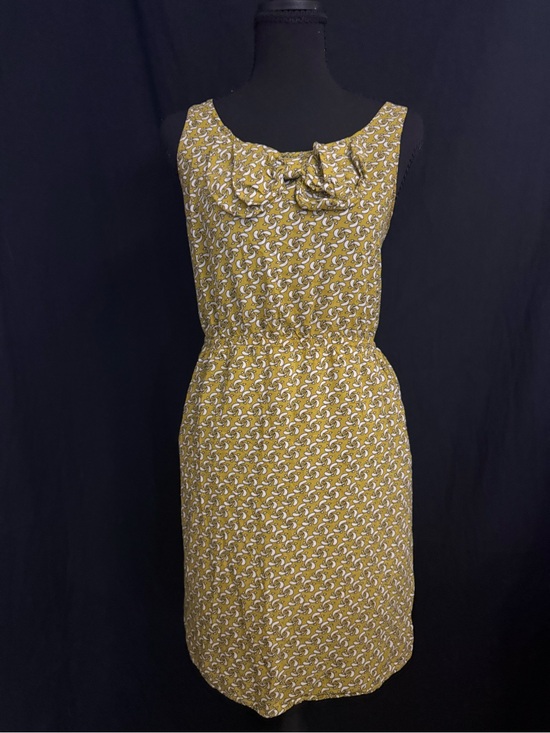 Cotton Candy Dresses & Skirts - Cotton Candy Mustard Geometric Bow-Front Sleeveless Midi Dress
